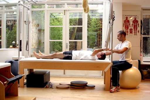 Tony Kosoko at work in our in house Pilates Studio